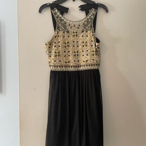 Formal dress with crystals in great condition.